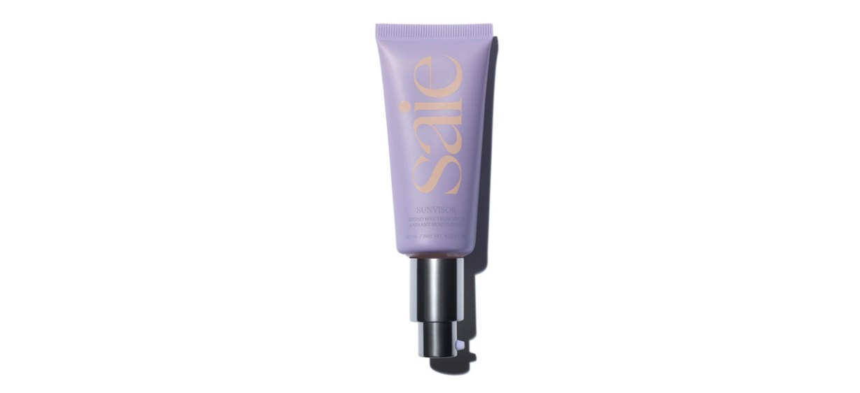 Purple tube of Saie Sunvisor Radiant Moisturizing Face Sunscreen SPF 35 on white background