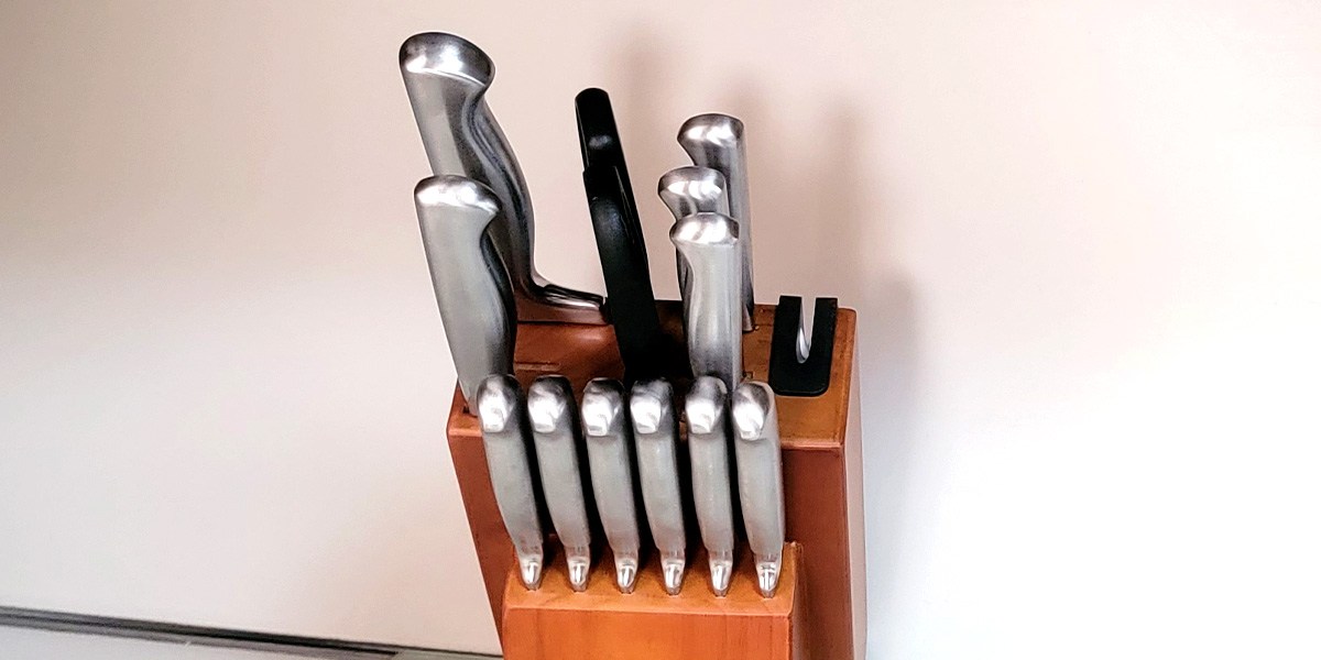 McCook Knife Set on kitchen counter with closeup view of knife sharpener McCook Knife Set on kitchen counter with closeup view of knife sharpener