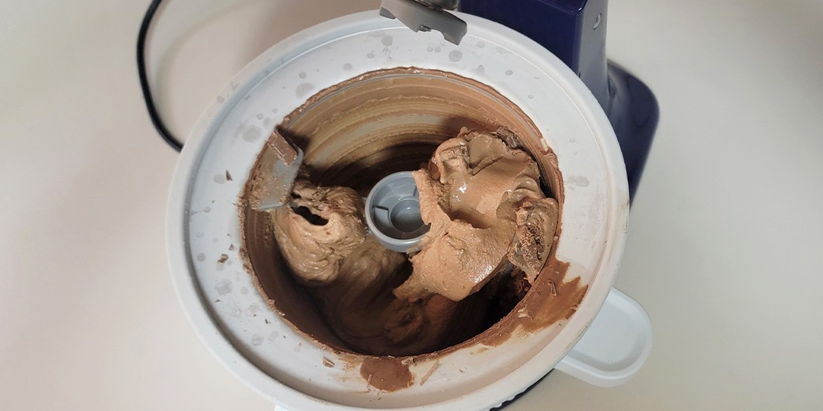 KitchenAid Ice Cream Maker Attachment bowl with chocolate ice cream inside KitchenAid Ice Cream Maker Attachment bowl with chocolate ice cream inside