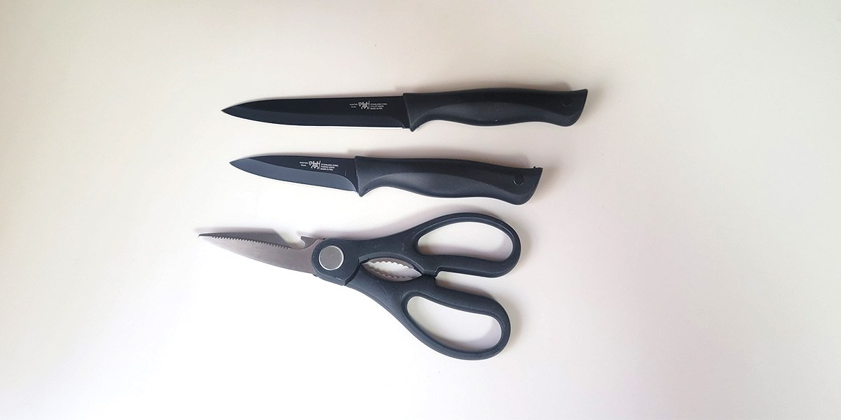 Hunter.Dual Knife Set Scissors and two knives on counter Hunter.Dual Knife Set Scissors and two knives on counter